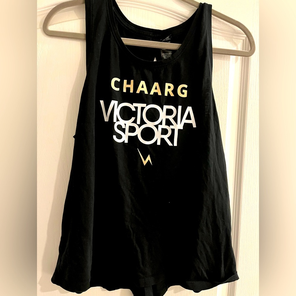 Victoria Secret athletic wear tank with cutouts and a tie in the back